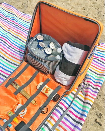 Interior carrying space of the Playamigo ground chair, showing it has room to carry a small cooler and other items for a day outdoors.
